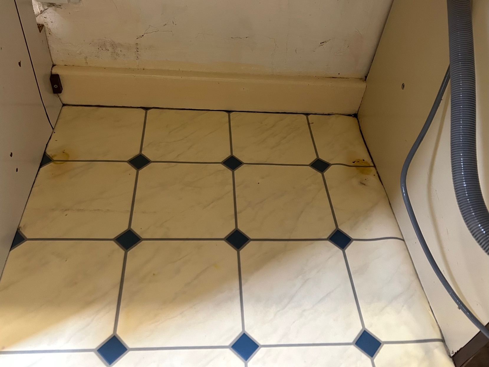 Under the washer